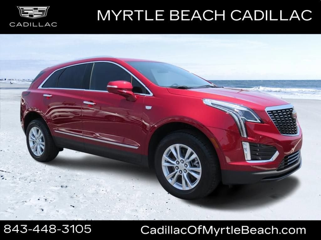 2026 Cadillac XT5 Luxury in Radiant Red Tintcoat — front three-quarter view
