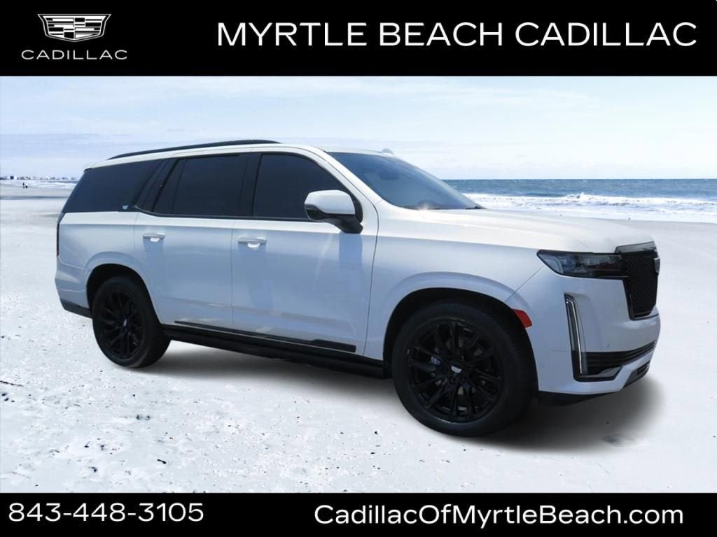 2024 Cadillac Escalade Sport in Crystal White Tricoat — front three-quarter view